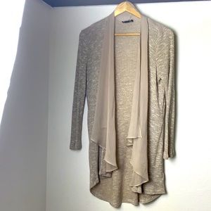 Beige cardigan with soft ruffle neckline